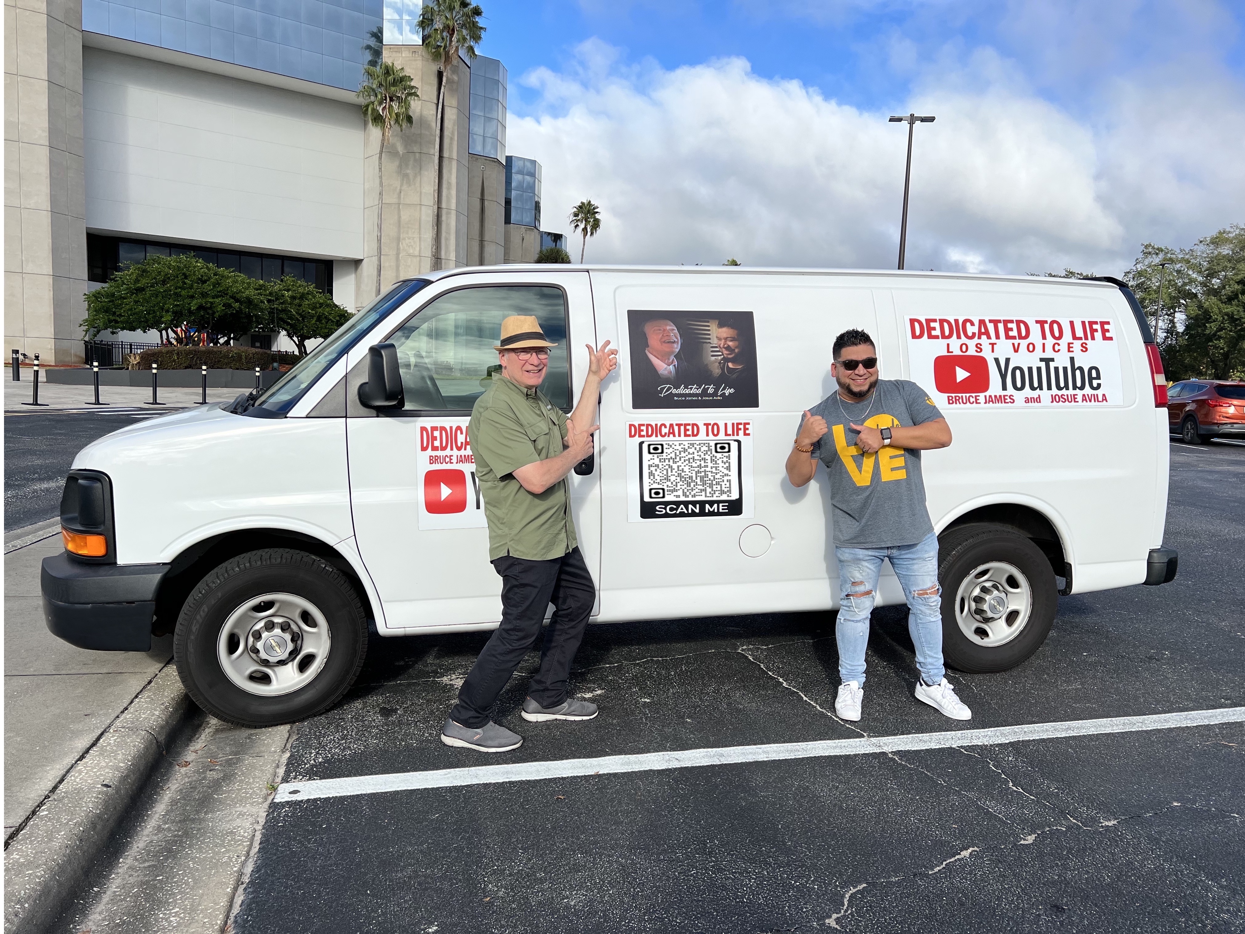 Bruce James and Josue Avila with the Dedicated to Life van