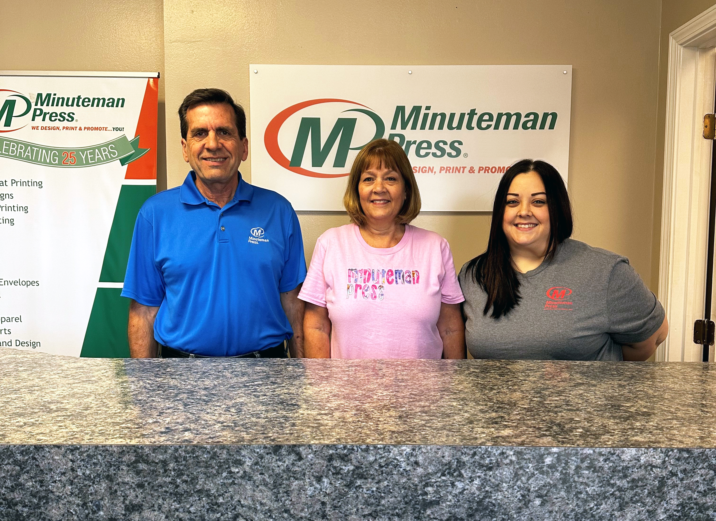 Left to right: Owners Jim &amp; Jane Sweeney along with their daughter Allison Everett (Production Manager) at their Minuteman Press franchise in Houston, Texas. Jane notes that Allison is a vital part of our DTF program.