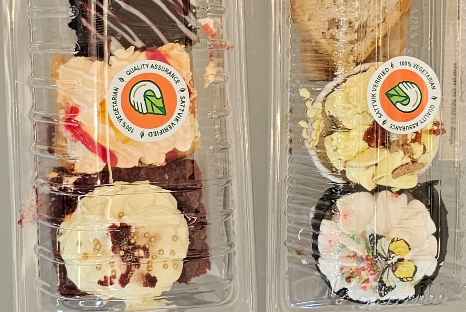 Sattvik Certified stickers pasted on the Vegetarian Cakes