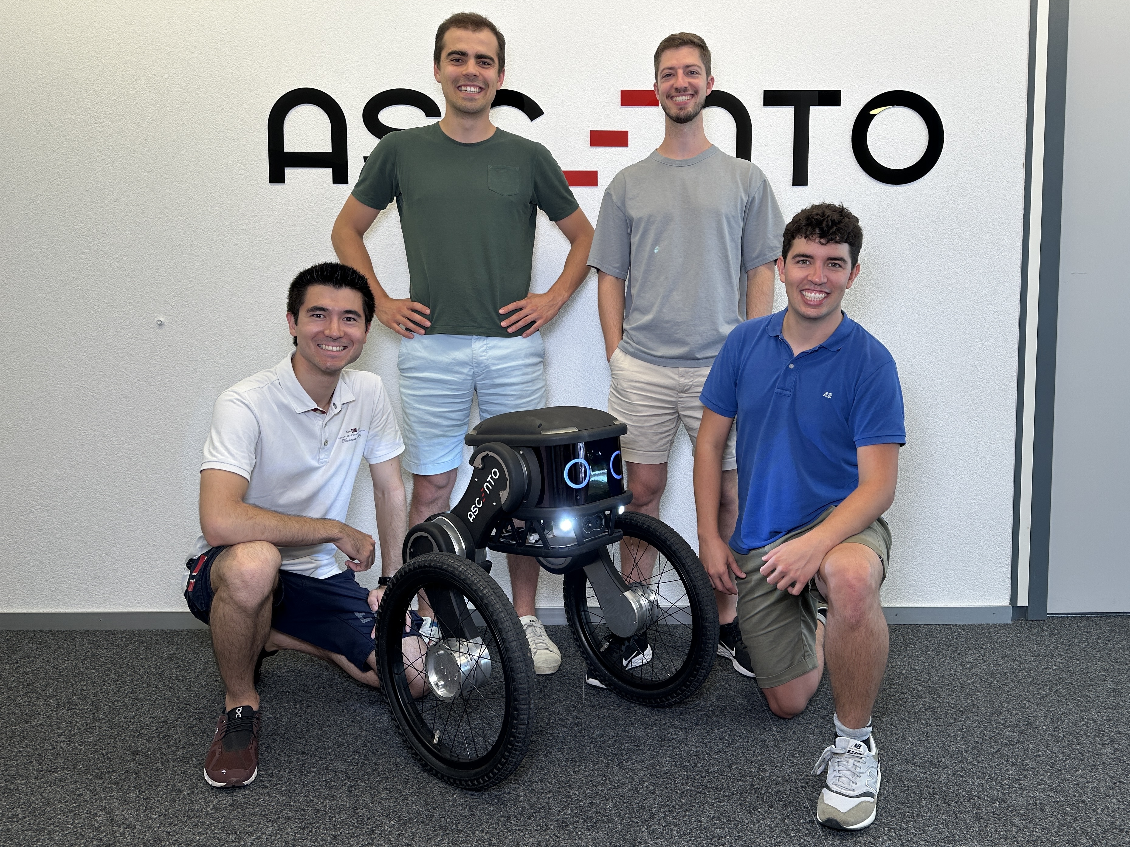The Ascento Guard flanked by its founders: (L to R) Dominik Mannhart, Alessandro Morra, Ciro Salzmann and Miguel de la Iglesia Valls.