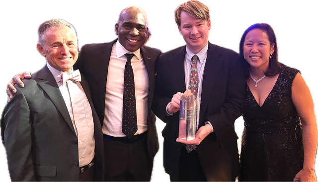 (Left to Right) Municipal Advisor Nat Singer, President of Infrastructure and Public Finance at SWS Gary Hall, Chicago Debt Manager Brenden White (holding trophy), and Former City of Chicago CFO Jennie Bennett. (Photo Credit: Siebert Williams Shank)