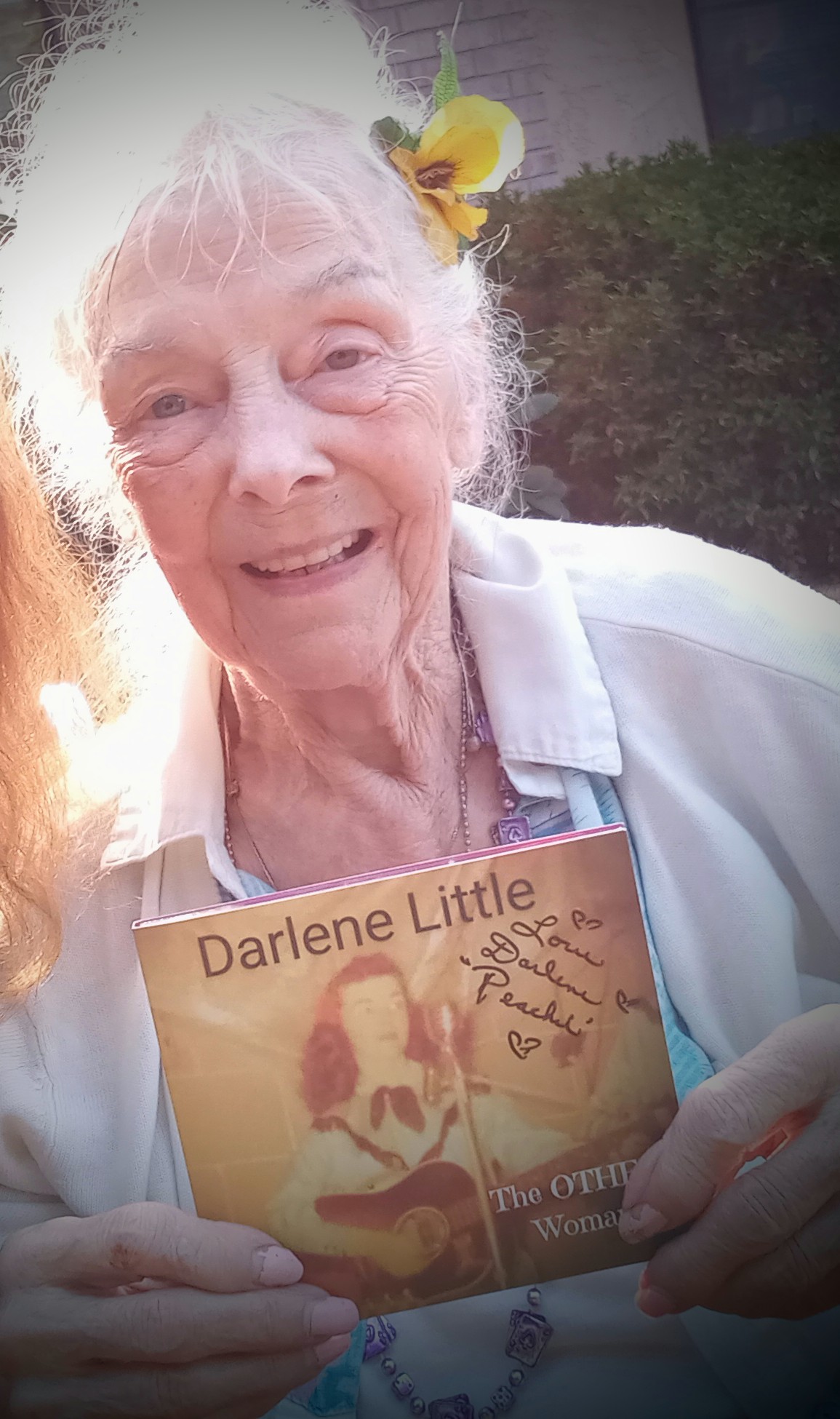 Darlene Little holding CD