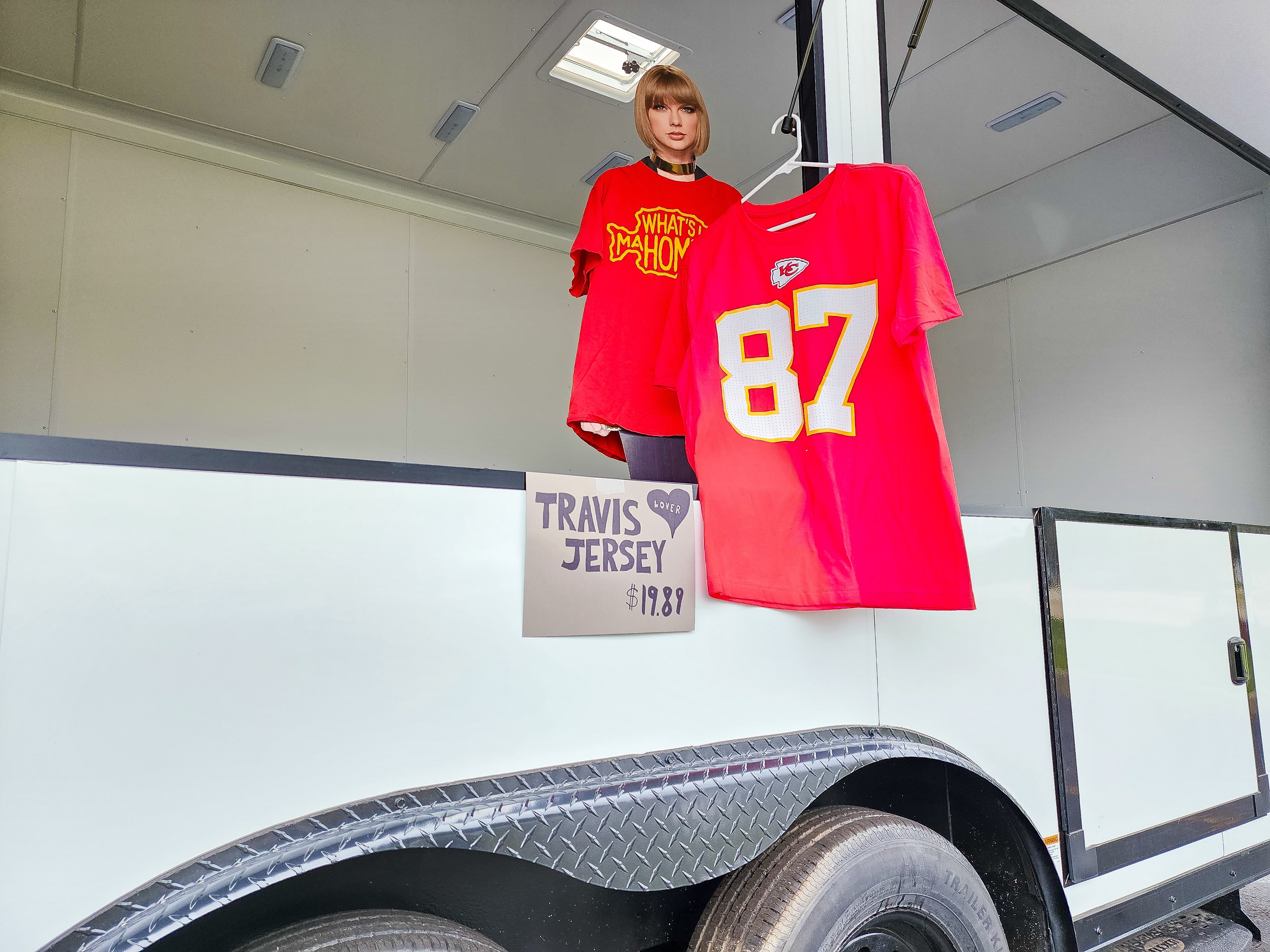 The Chiefs play the Packers tonight so Taylor is pushing Kelce gear in Chicagoland