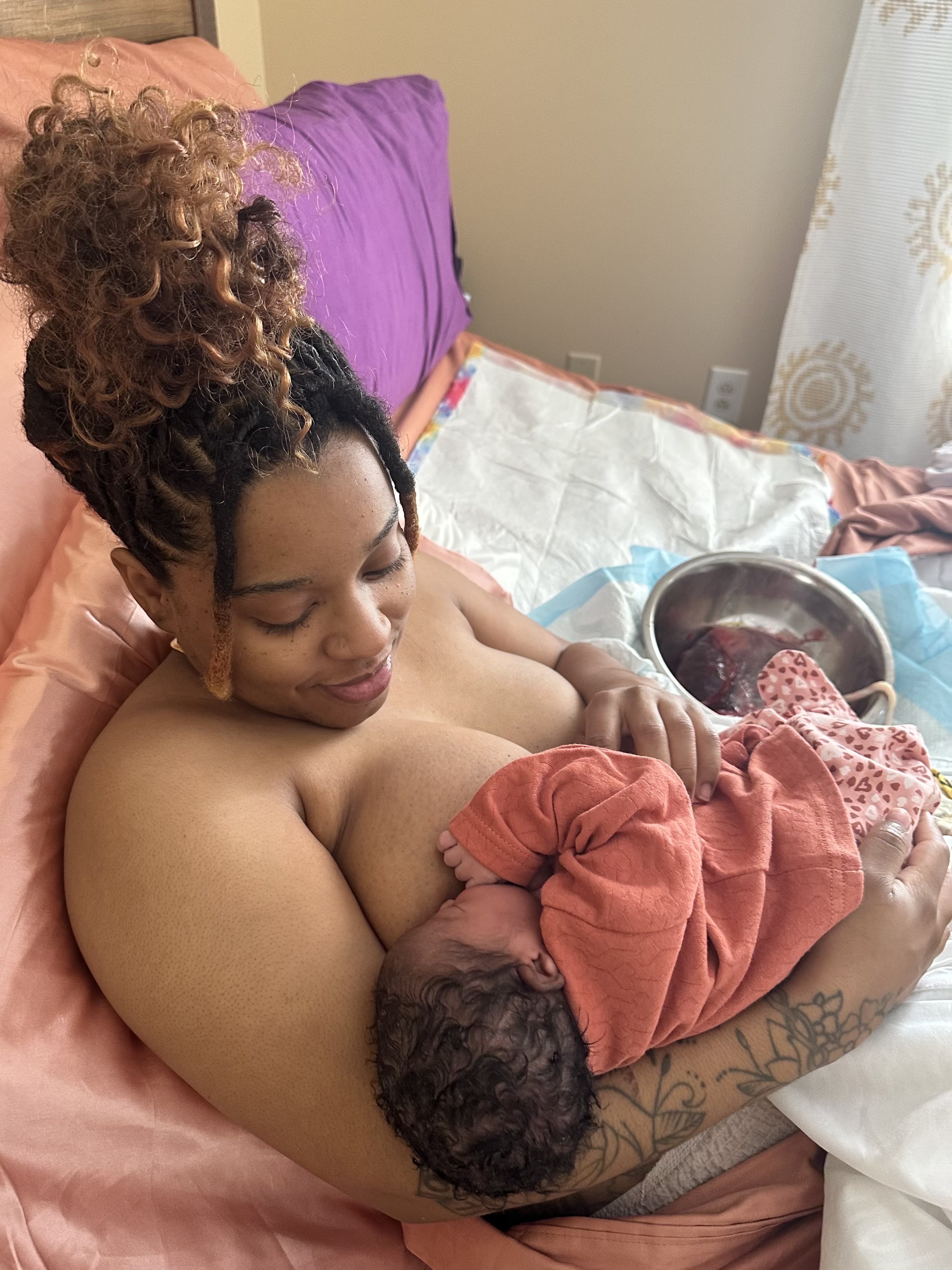 Whitney Lewis holds daughter Yariah Selene born at Gather Grounded Midwifery with LawlerQueen