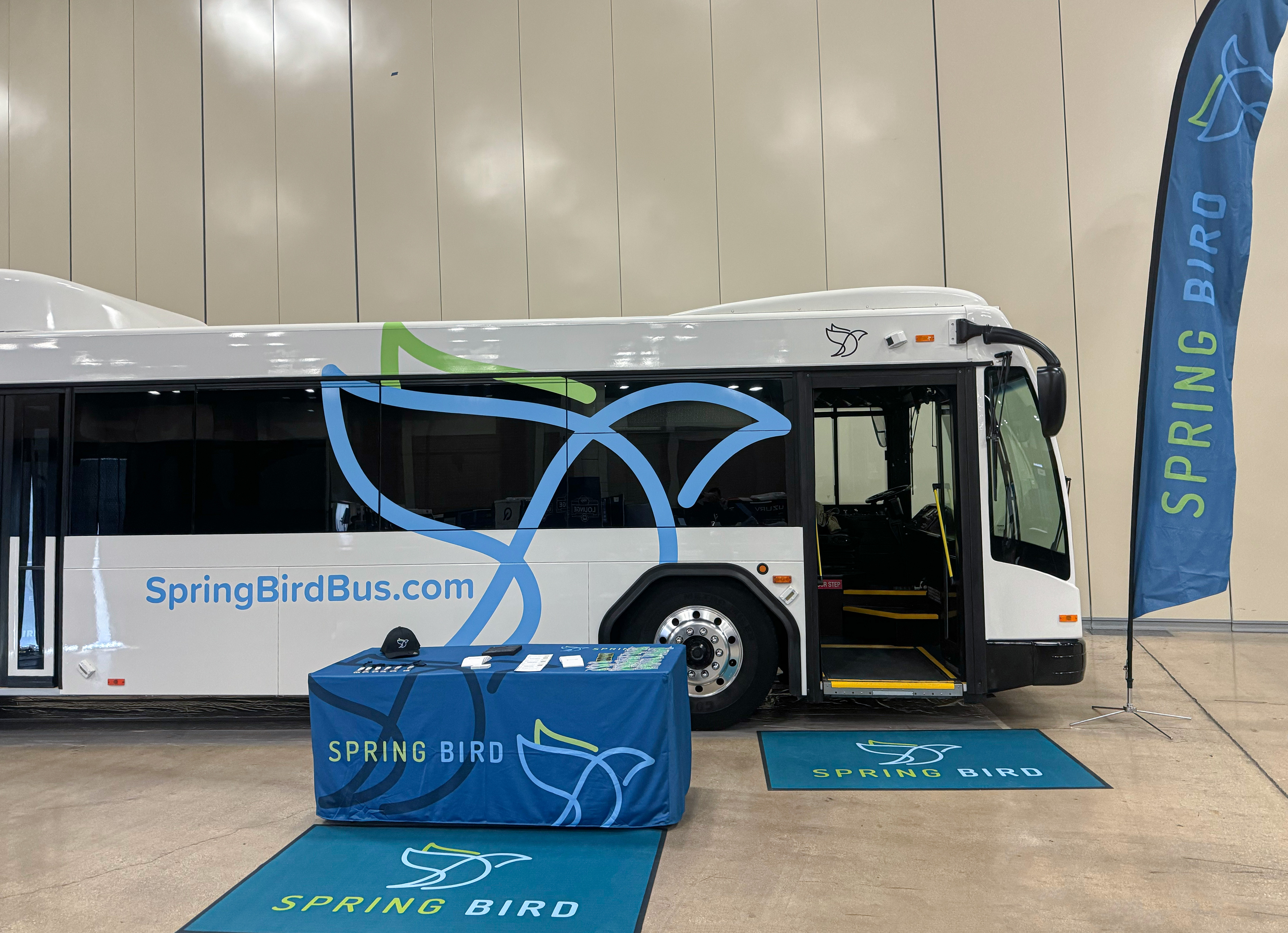 Spring Bird displays a 40ft hybrid-electric transit bus at the 2024 Texas Transit Association&#39;s Expo &amp; Conference in San Antonio, TX.