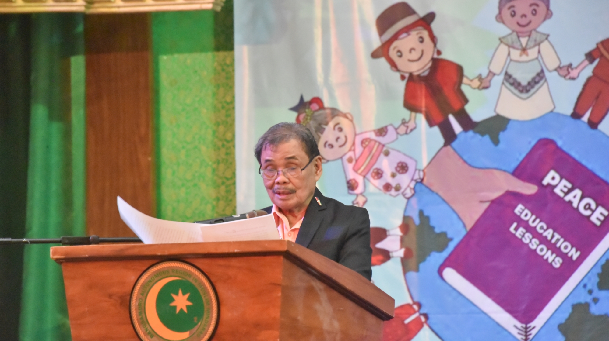 Mohagher Iqbal Minister of Basic Higher and Technical Education delivering a commemorative speech