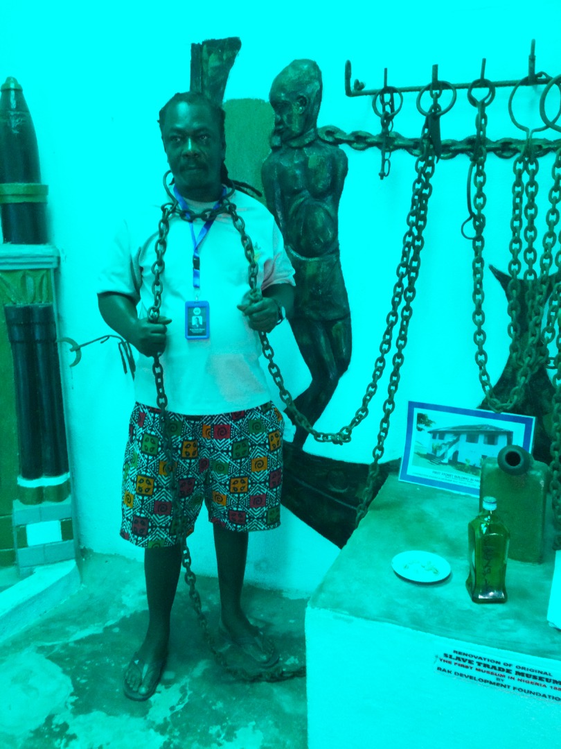 Prince Emeka wrapped in Slave Chains at the Slave Trade Museum
